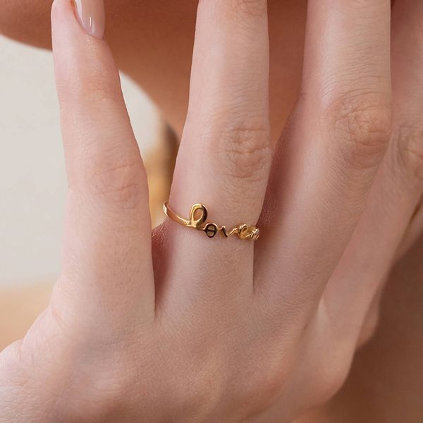 Каблучка Love у жовтому золоті з фіанітом 819352 819352 фото